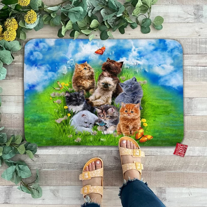 Kitten Playing in Garden Doormat