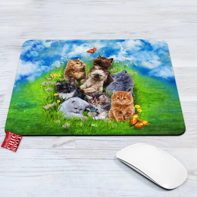 Kitten Playing in Garden Mouse Pad